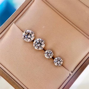 Tiffany Solitaire single diamond earrings four prong earrings
