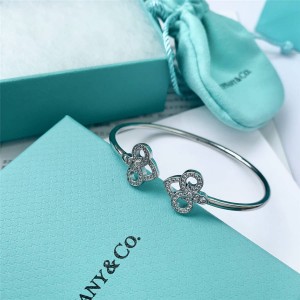 Tiffany Fleur de Lis series coil bracelet with diamonds