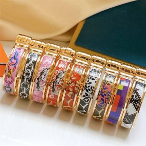 Hermes narrow printed enamel hinged bracelet rose gold